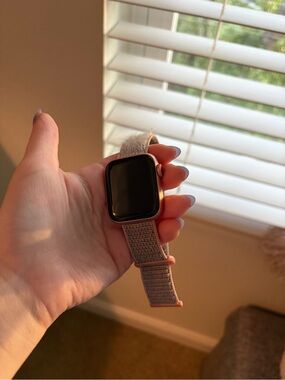 Apple Watch Rose Gold 40mm S5 w cellular. Comes w charger, box, &extra bands.